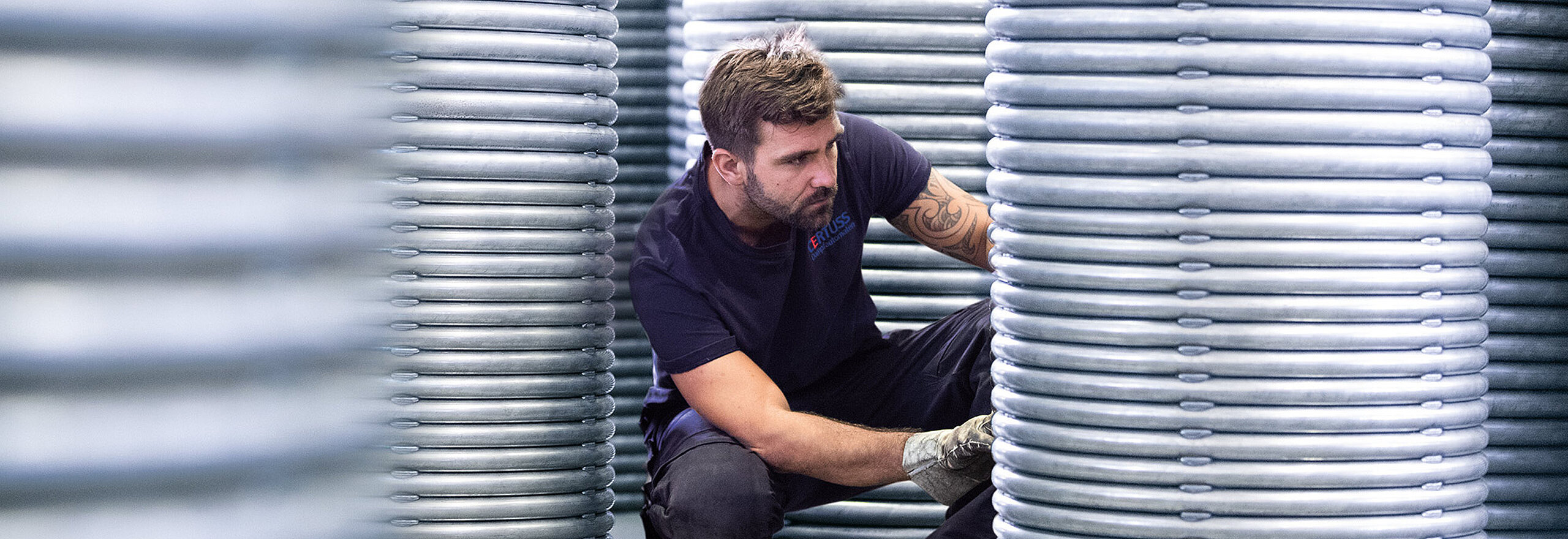 CERTUSS employee between several steam generator coils